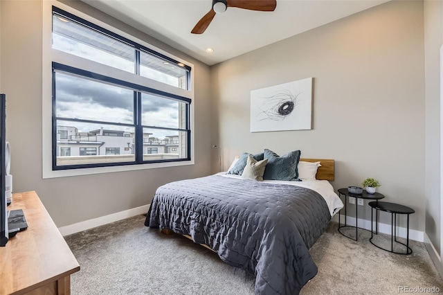 6849 E Lowry Blvd, Denver, CO 80230 - carpeted bedroom with baseboards and a ceiling fan