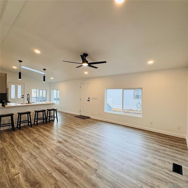 7200 E State Highway 14 Unit 27, Fort Collins, CO 80524 - living area with baseboards, wood finished floors, recessed lighting, and ceiling fan