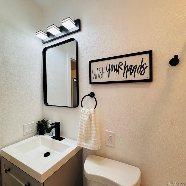 7200 E State Highway 14 Unit 27, Fort Collins, CO 80524 - half bathroom featuring toilet and vanity