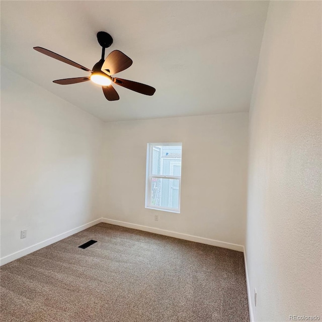 7200 E State Highway 14 Unit 27, Fort Collins, CO 80524 - spare room featuring carpet flooring, baseboards, and a ceiling fan