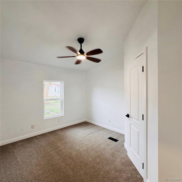 7200 E State Highway 14 Unit 27, Fort Collins, CO 80524 - unfurnished room with carpet floors, ceiling fan, and baseboards