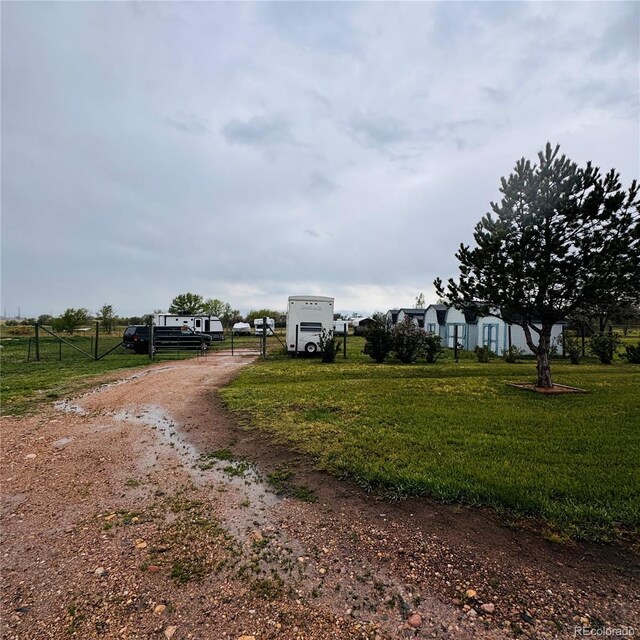7200 E State Highway 14 Unit 27, Fort Collins, CO 80524 - view of dirt / gravel driveway with a gated entry and a gate