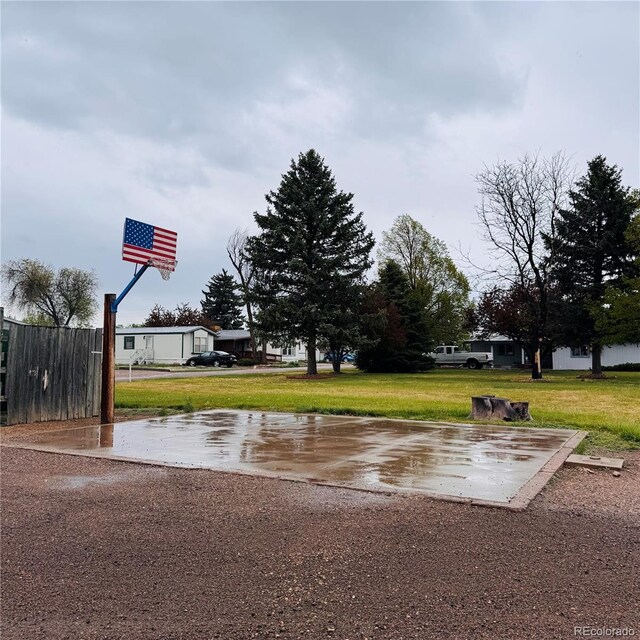 7200 E State Highway 14 Unit 27, Fort Collins, CO 80524 - view of grassy yard with community basketball court