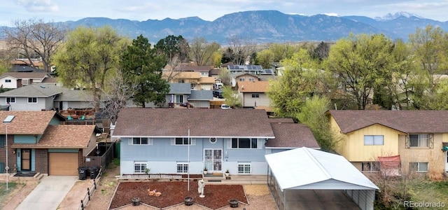 bird's eye view with a mountain view and a residential view