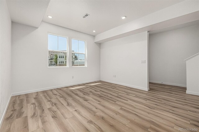 2887 E 103rd Dr, Thornton, CO 80229 - spare room with recessed lighting, light wood-style flooring, and baseboards