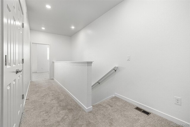 2887 E 103rd Dr, Thornton, CO 80229 - corridor with an upstairs landing, carpet floors, baseboards, and recessed lighting