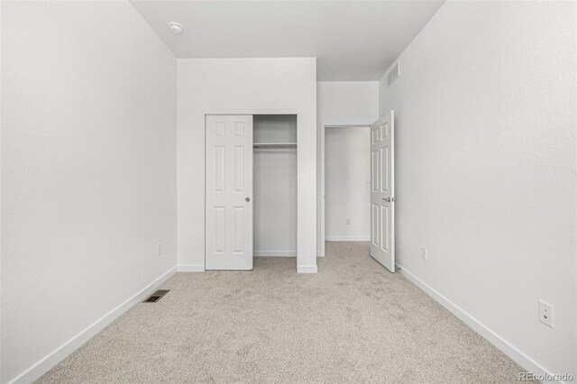 2887 E 103rd Dr, Thornton, CO 80229 - unfurnished bedroom featuring carpet floors, baseboards, and a closet