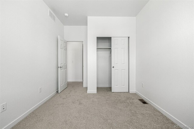 2887 E 103rd Dr, Thornton, CO 80229 - unfurnished bedroom with carpet flooring, baseboards, and a closet