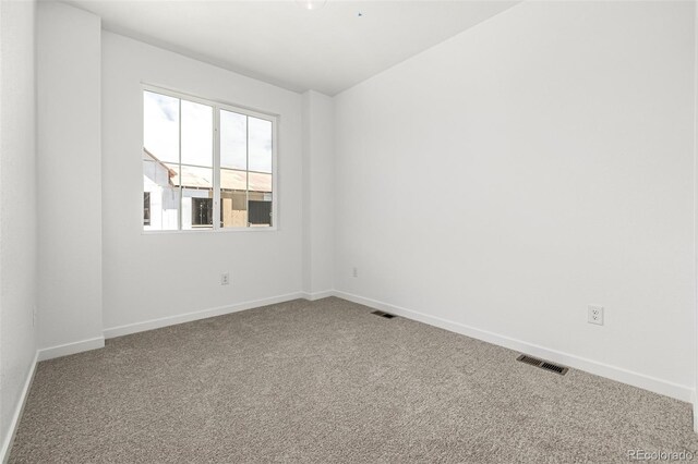 2887 E 103rd Dr, Thornton, CO 80229 - carpeted spare room featuring baseboards