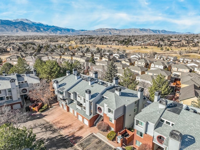 drone / aerial view featuring a mountain view