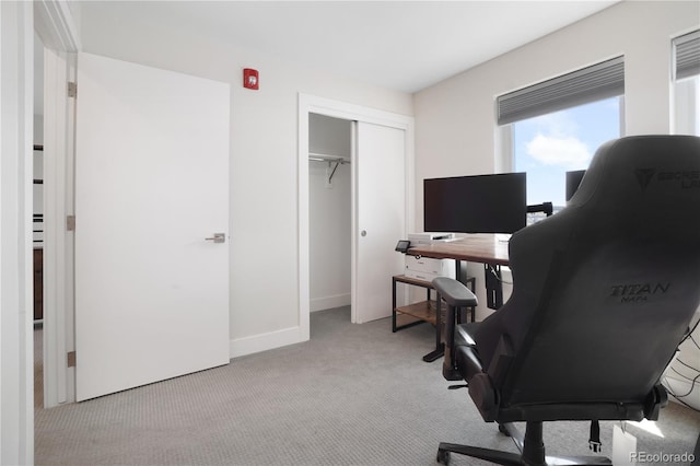 office area with light colored carpet