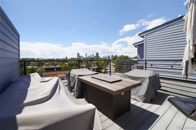 wooden terrace with grilling area