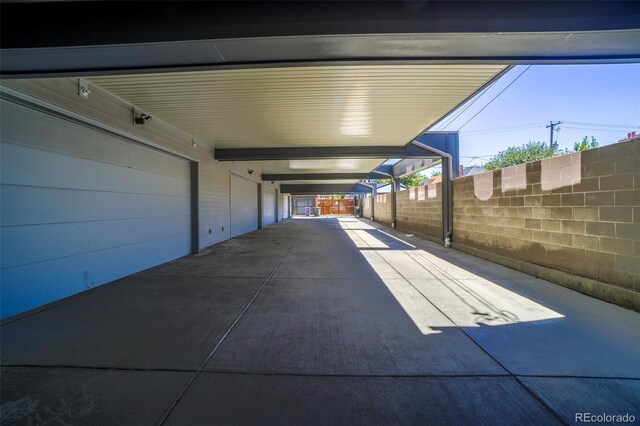 view of patio featuring a carport