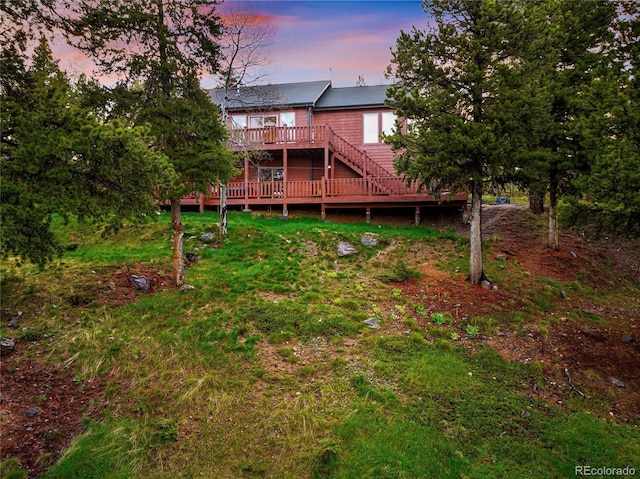 11163 Conifer Mountain Rd, Conifer, CO 80433 - rear view of property with a wooden deck