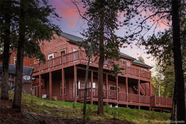 11163 Conifer Mountain Rd, Conifer, CO 80433 - rear view of property with a wooden deck