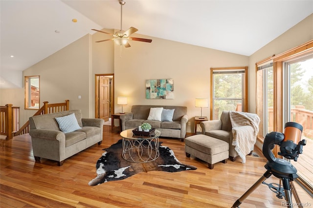11163 Conifer Mountain Rd, Conifer, CO 80433 - living room with wood finished floors, ceiling fan, and high vaulted ceiling