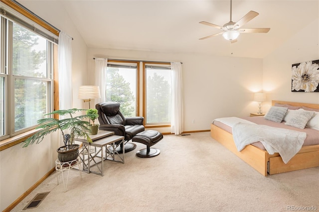 11163 Conifer Mountain Rd, Conifer, CO 80433 - carpeted bedroom with lofted ceiling, multiple windows, baseboards, and ceiling fan