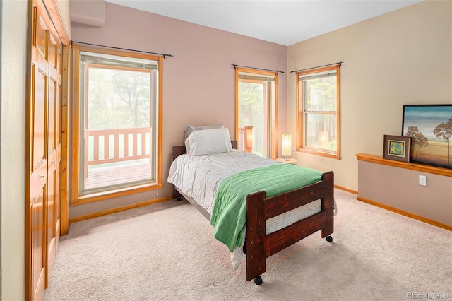 11163 Conifer Mountain Rd, Conifer, CO 80433 - bedroom with carpet and baseboards