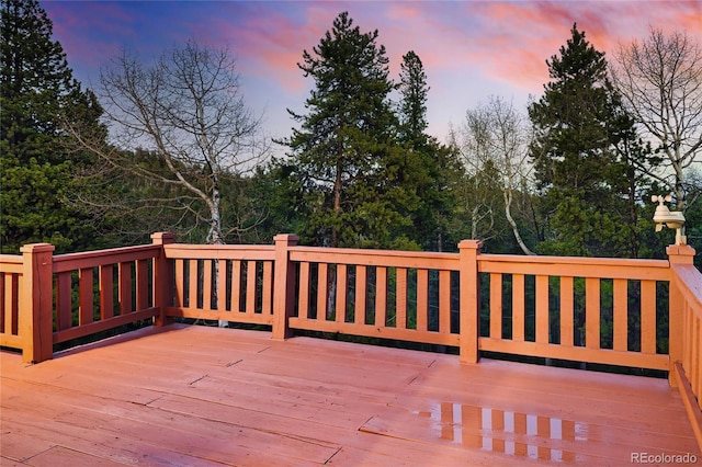 11163 Conifer Mountain Rd, Conifer, CO 80433 - view of deck at dusk