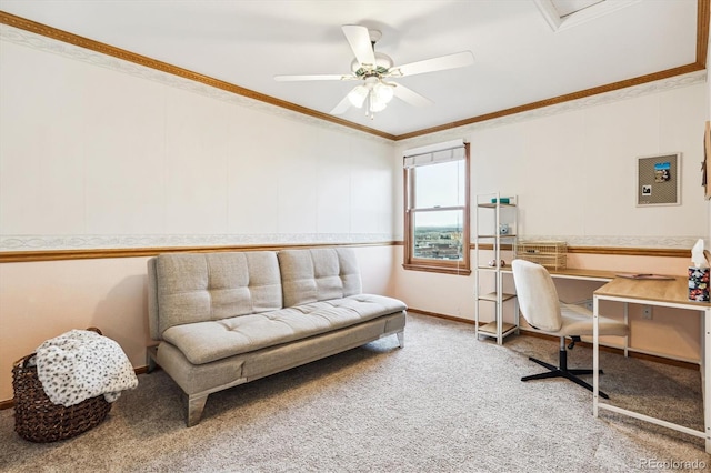 carpeted home office with ceiling fan and ornamental molding