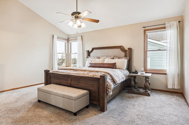 bedroom featuring lofted ceiling, light colored carpet, and ceiling fan