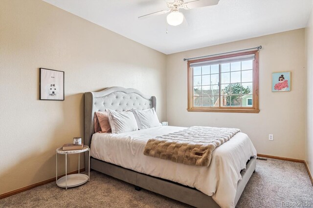 carpeted bedroom featuring ceiling fan