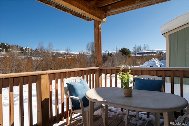 view of snow covered deck