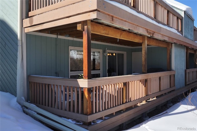 view of snow covered deck