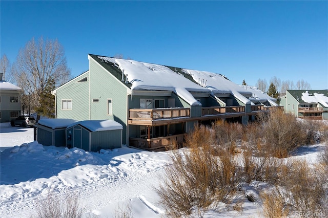 view of snow covered property