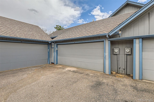 garage featuring driveway