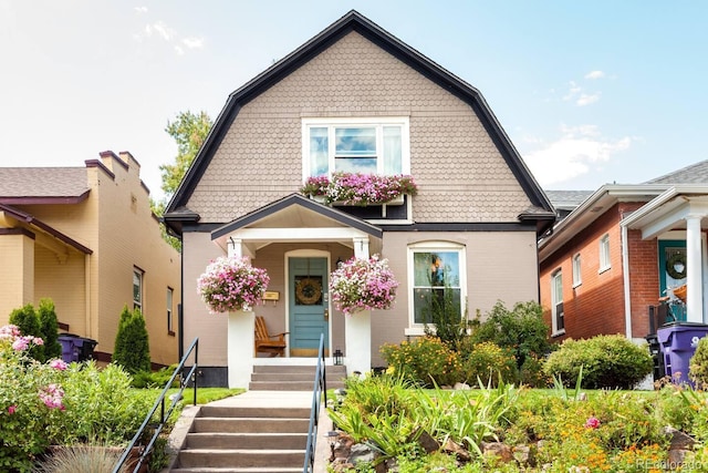 dutch colonial featuring a gambrel roof