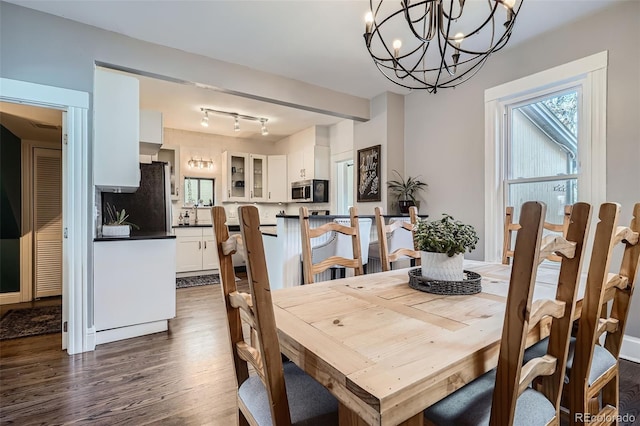 dining room with dark wood-style floors