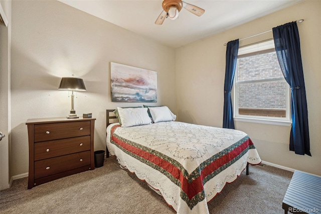 bedroom featuring light carpet and ceiling fan