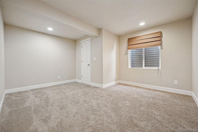 spare room featuring carpet flooring