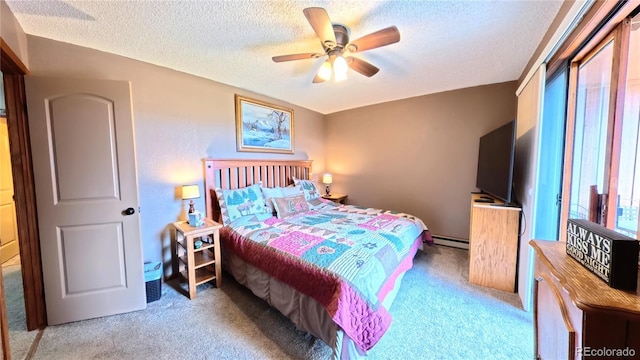 366 Gcr 4421, Grand Lake, CO 80557 - carpeted bedroom featuring a baseboard heating unit, a textured ceiling, and a ceiling fan