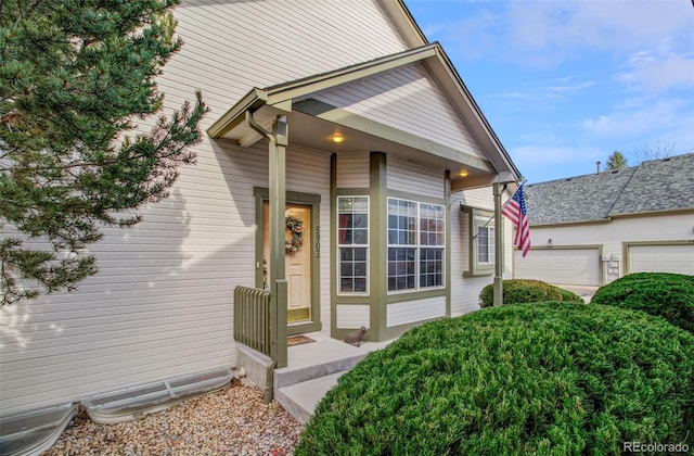 property entrance with a garage