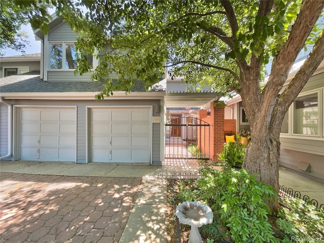 view of front of property featuring a garage