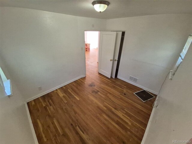 1266 Del Mar Pkwy, Aurora, CO 80010 - empty room featuring wood finished floors and baseboards