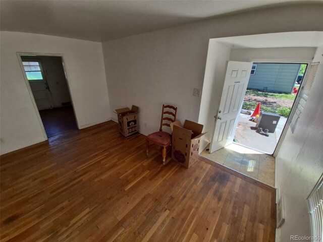 1266 Del Mar Pkwy, Aurora, CO 80010 - living area featuring hardwood / wood-style floors