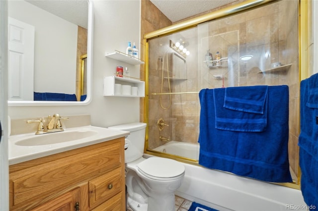 full bath with a textured ceiling, vanity, enclosed tub / shower combo, and toilet