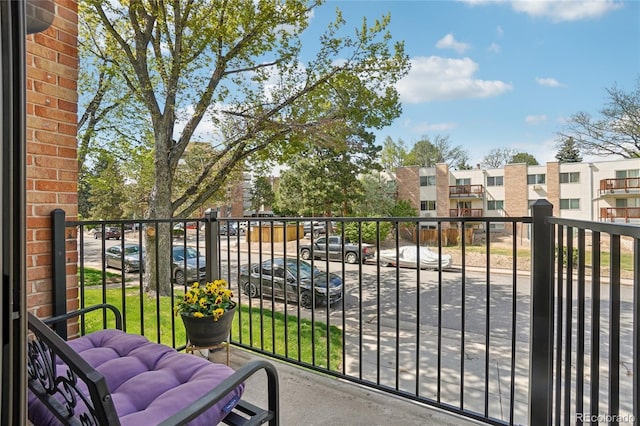 balcony featuring a residential view