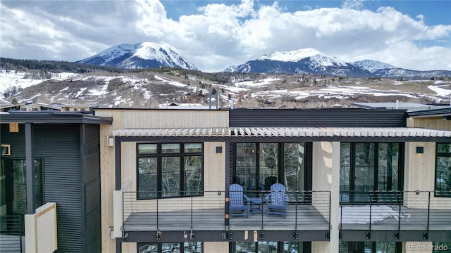 exterior space featuring a mountain view