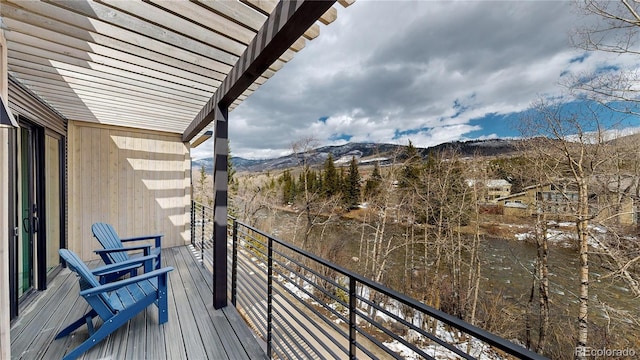 balcony featuring a mountain view