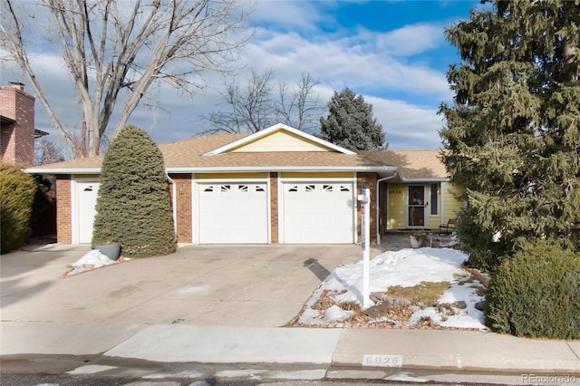 ranch-style home with a garage