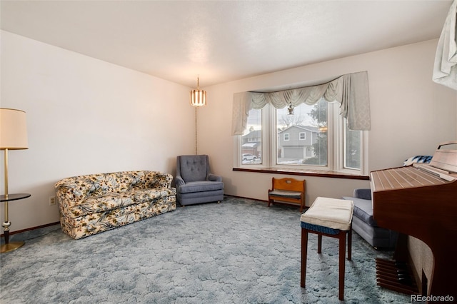 sitting room with carpet floors