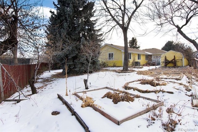 view of yard covered in snow