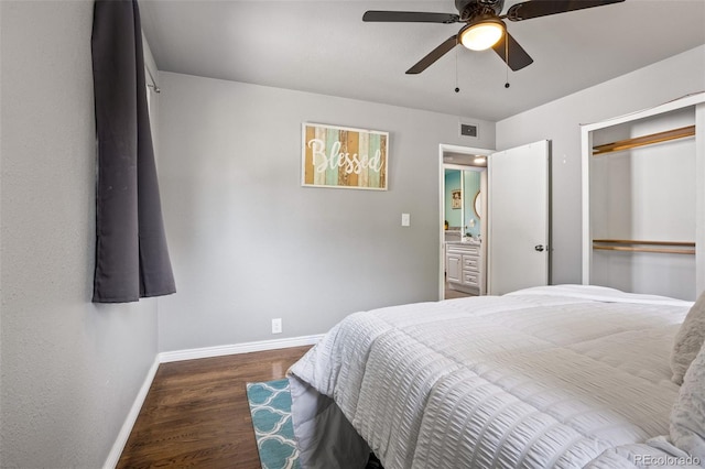 bedroom with visible vents, baseboards, wood finished floors, a closet, and a ceiling fan