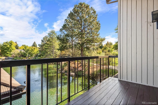 balcony featuring a water view