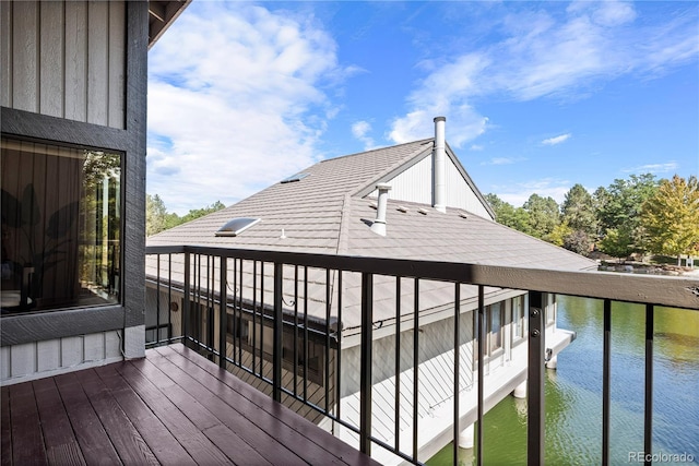 deck featuring a water view