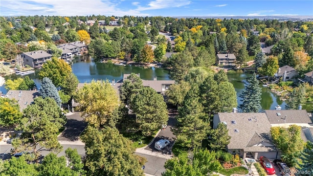 bird's eye view with a water view